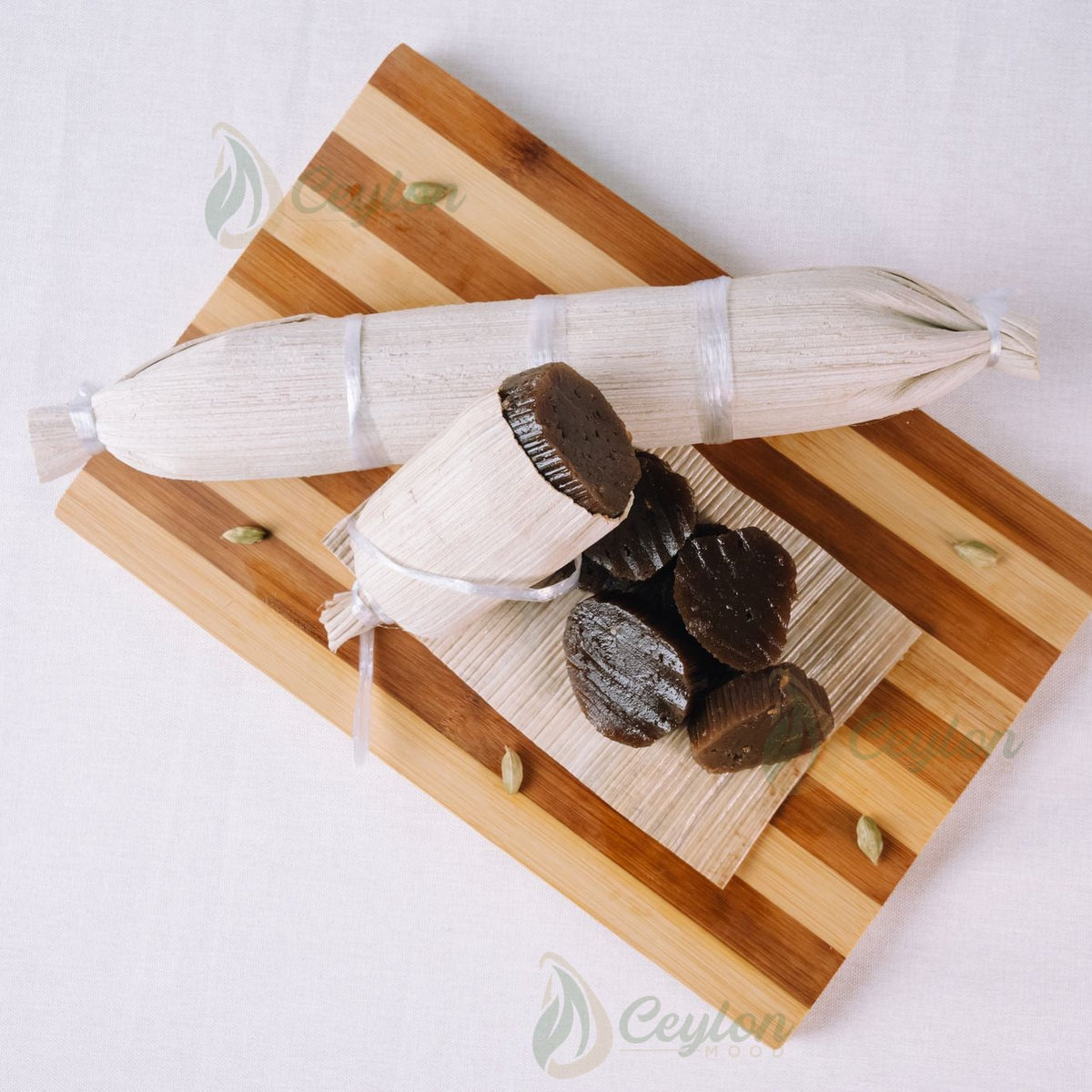 Top view of Patta Dodol with cardamom on a wooden board, Ceylon Mood