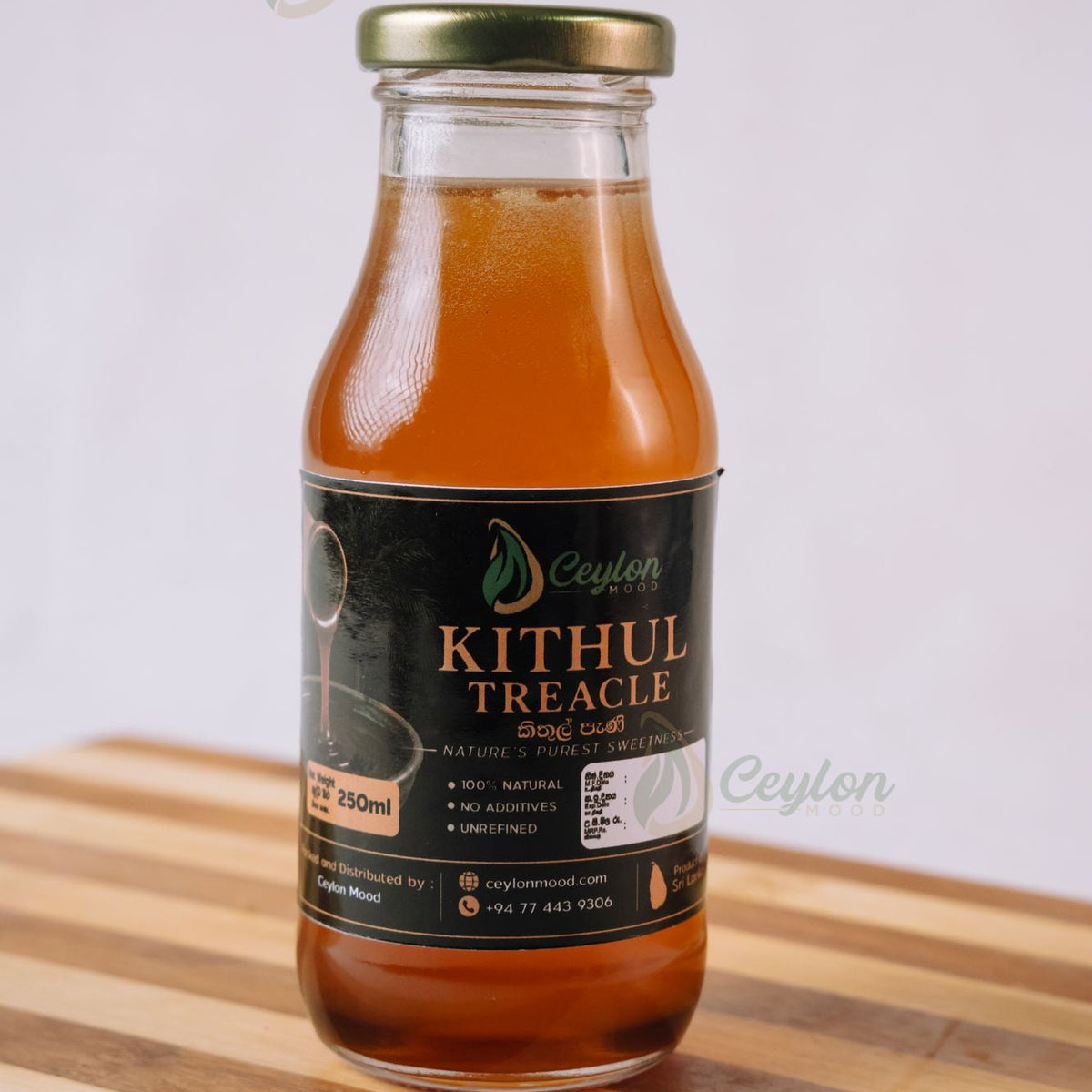 Pure Kithul Treacle in a glass bottle with a black label, Ceylon Mood